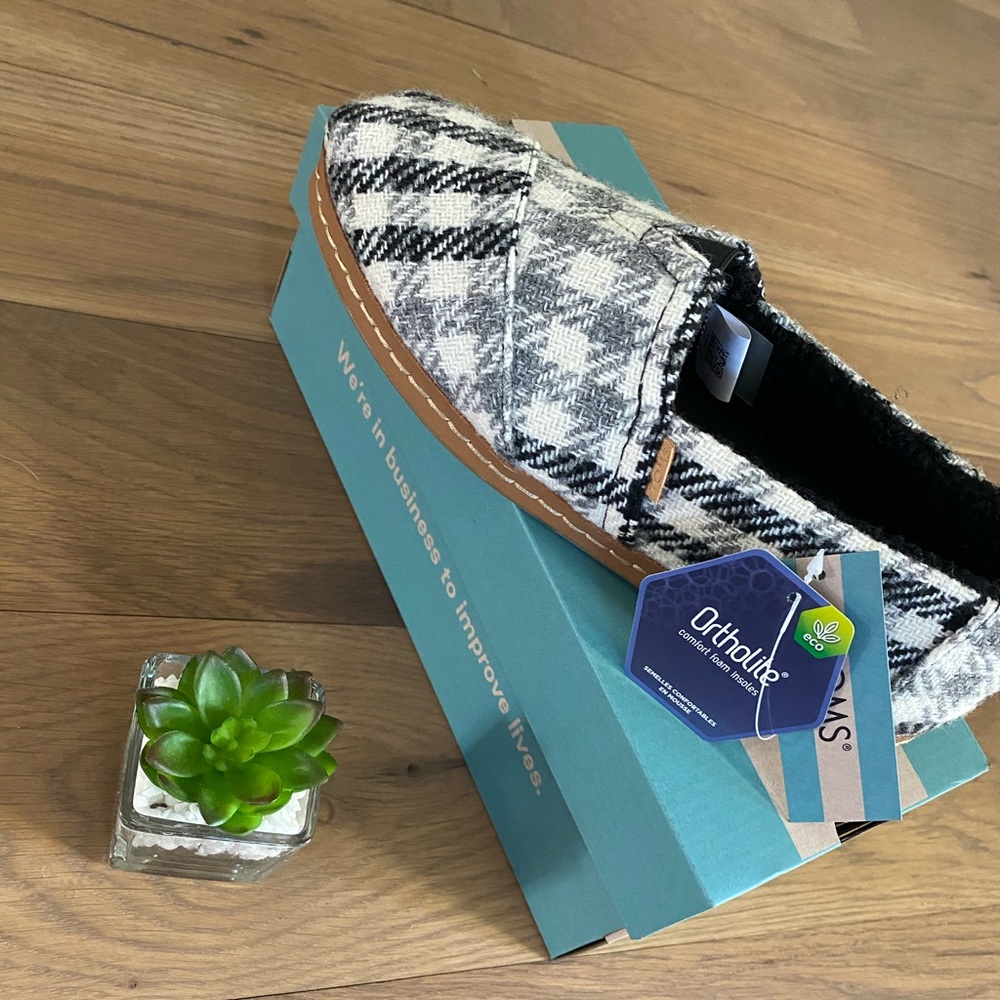 TOMS Black and white checkered slippers
